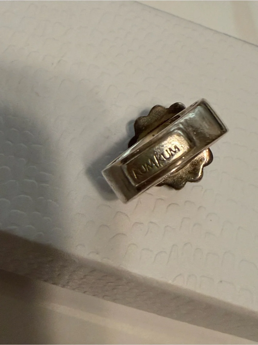 Vintage Sterling silver KumKum ring with blue topaz